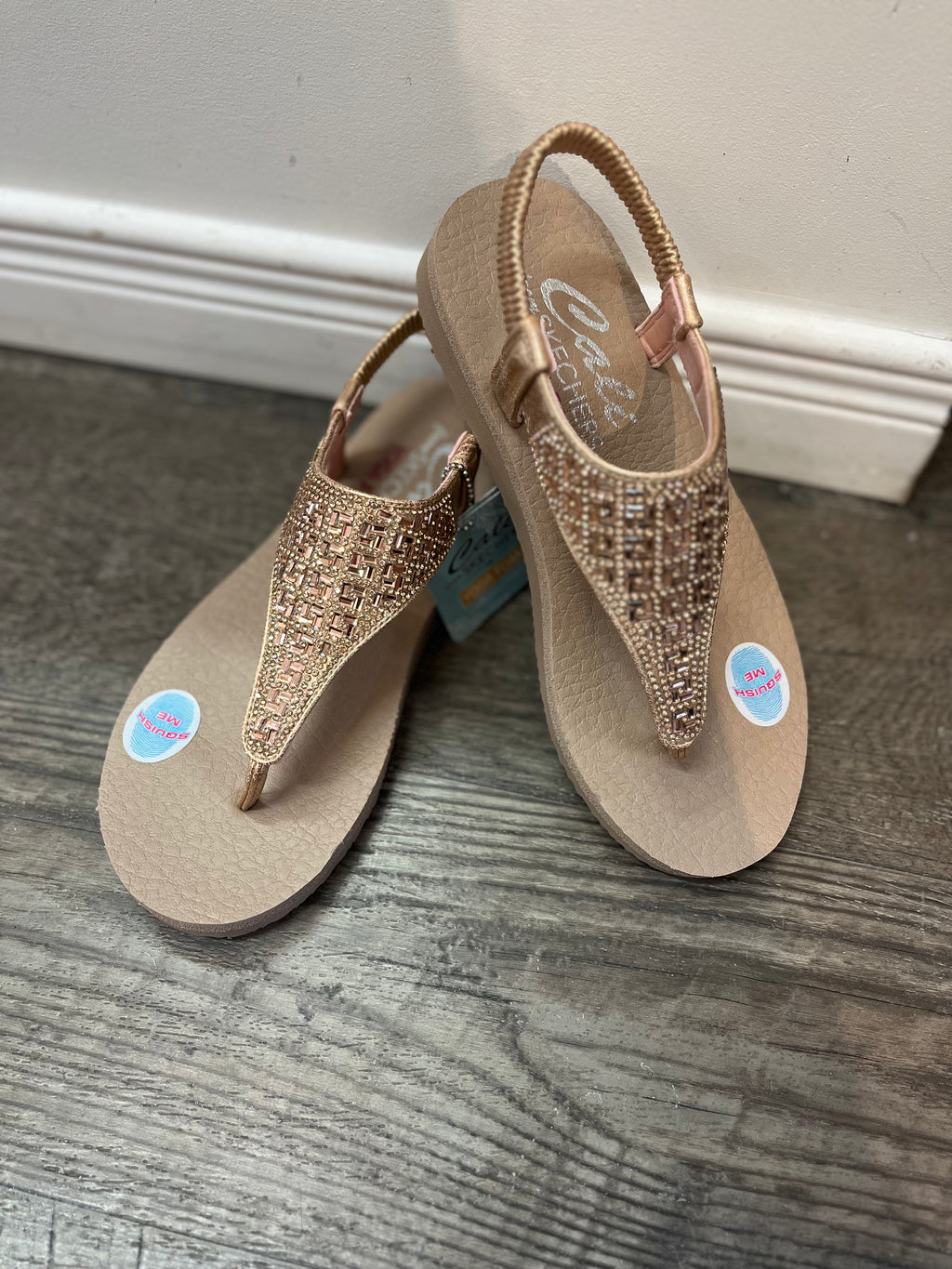 Skechers meditation rock sales crown rose gold